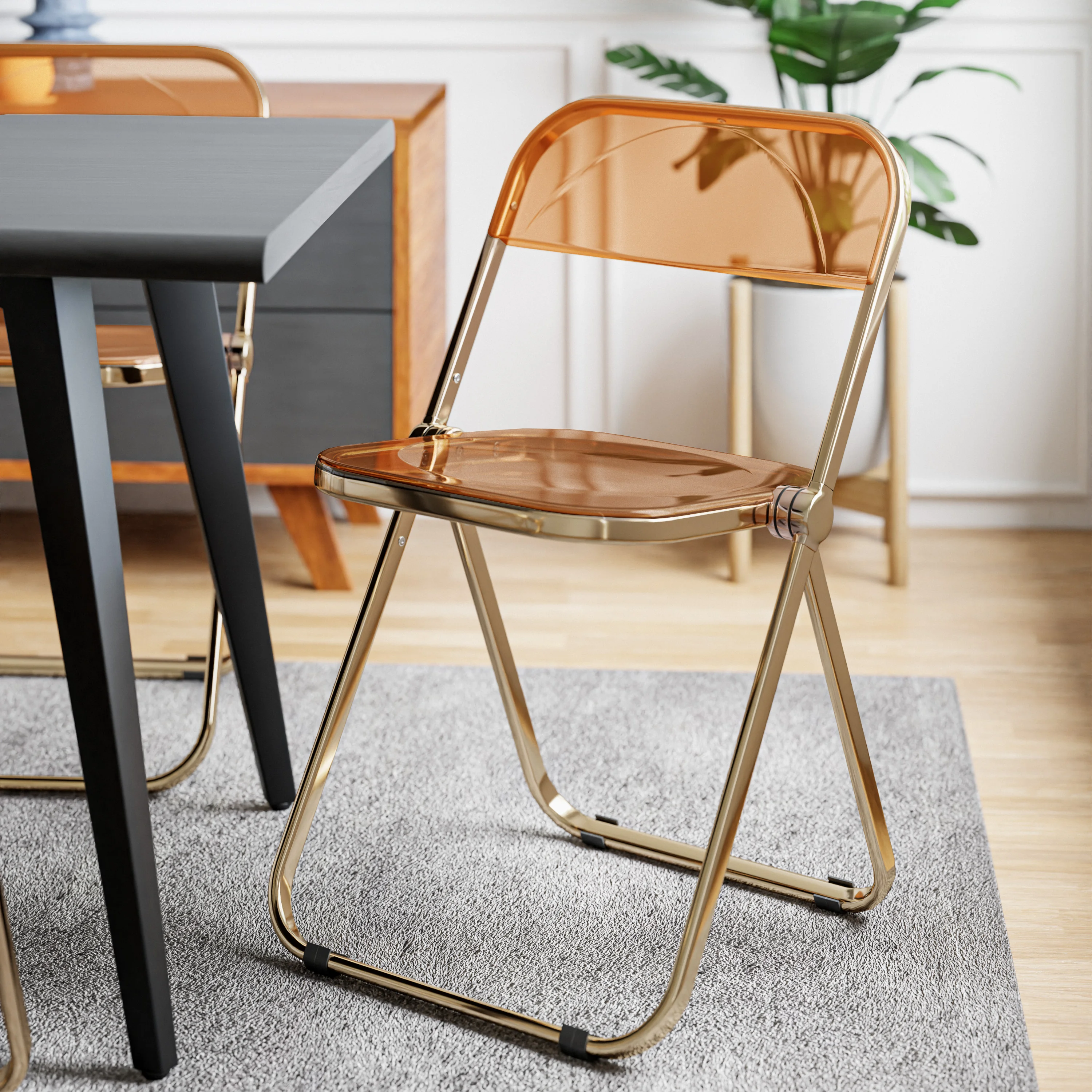 Lawrence Acrylic Folding Chair With Gold Metal Frame