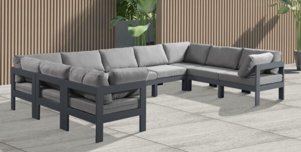 Nizuc 150" Water Resistant Fabric Upholstered Outdoor Patio 9pc. Modular Sectional